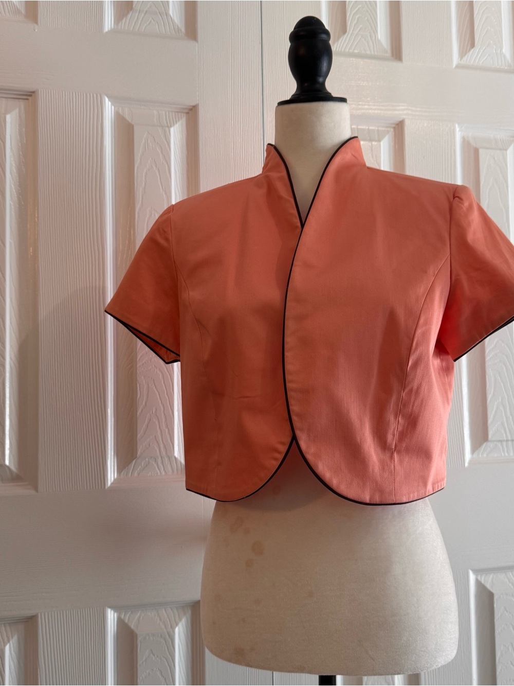 Studio I Coral Cropped Short Sleeve Jacket with Brown Piping